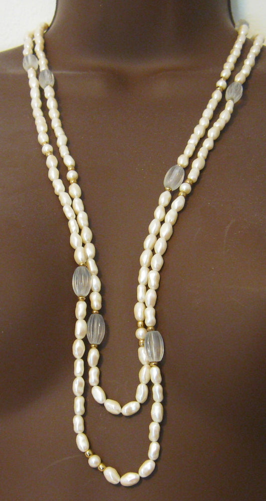 60" Vintage (circa 1968) Baroque Freshwater Cultured Pearl Necklace. Signed "Monet"